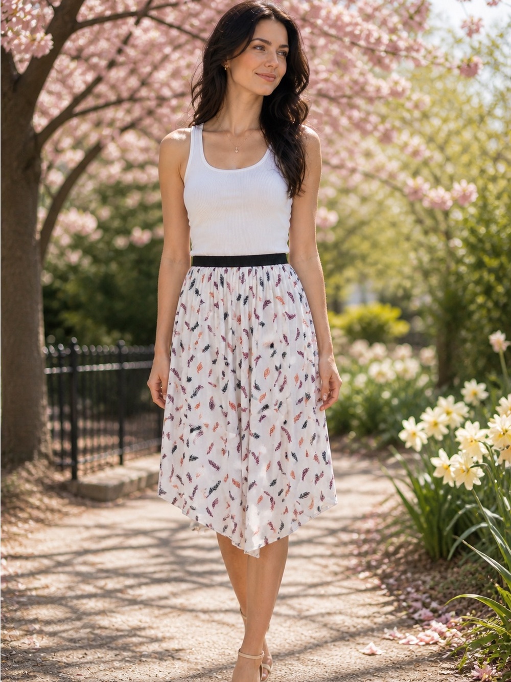 H&M Knee Length Asymmetrical Pleated Skirt with Feather Print